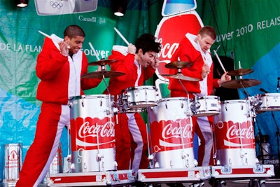 Three drummers performed as part of Zero Gravity's stage show, sponsored by Coca-Cola.