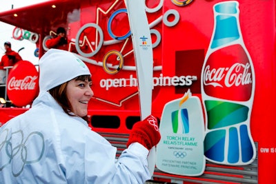 Coca-Cola ambassadors, dressed in clothing made from recycled PET bottles, have been cheering on torchbearers across the country.