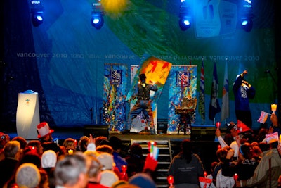 Bram Goldstein of BiG designed the concept for the RBC-sponsored stage show, which features an artist painting the image of a torchbearer on a rotating canvas.