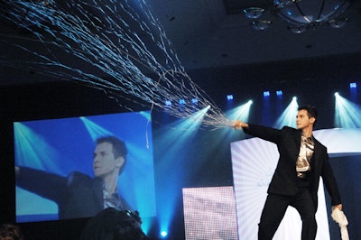 A magician performed during a circus-themed scene that featured clothes from Lucian Matis and was inspired by Sara Gruen's novel Water for Elephants.