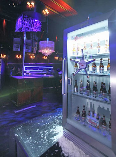 A safe filled with Coors Light bottles and two Super Bowl tickets, which the company gave away during a raffle, sat in the middle of the main dance floor at Mansion.