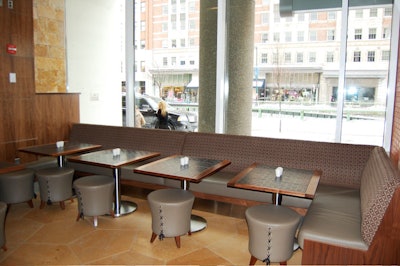 In the lounge, floor-to-ceiling windows look out onto busy Connecticut Avenue.