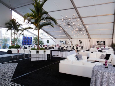Party Planners West erected three tents, filled with black and white lounge furniture from Taylor Creative Inc., to house the N.F.L. Tailgate.