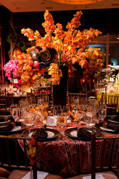 In addition to orchids, Sara Story Design's table incorporated masks and tiger figurines, perhaps as a nod to 2010 being the Chinese year of the tiger.