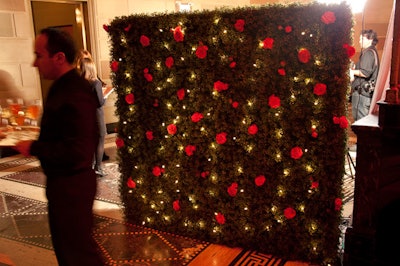 A hedge served as an impromptu backdrop for guests who wanted to have their photos taken with their dogs.