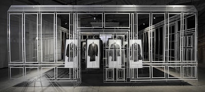 Open to the public until Thursday, Dunhill's pop-up also showcases 30 looks from the fall collection, each mounted to large frames and placed on easels.
