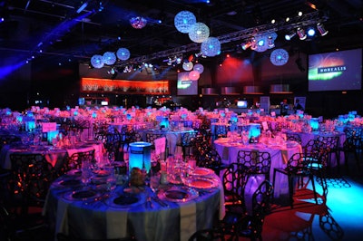 Illuminated tables added to the event's northern lights theme.