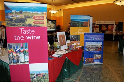 New York's Finger Lakes Wine Country had multiple signs at its booth in the Atrium Ballroom.