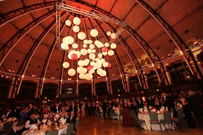 Around 500 guests sat for dinner in Navy Pier's grand ballroom, where red and white lanterns hung from the ceiling.