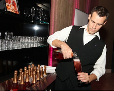 Two bars, and numerous waiters, served flutes of the new sparkling wine.