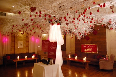 Guests were invited to write a one-word description of Toronto on a red paper heart, which could then be hung on an installation called the Toronto Tree of Love.