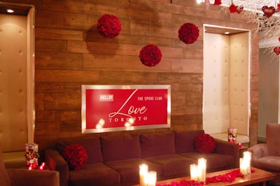 Orbs made of red roses hung from the ceiling and framed red signage featured the Love Toronto event logo.