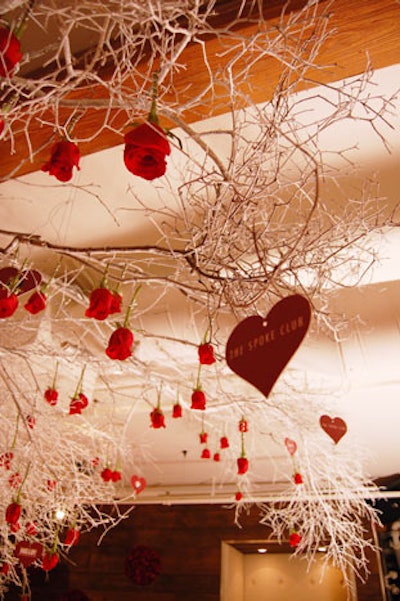 Red hearts on the Toronto Tree of Love installation featured the names of sponsors such as Hello! Canada, the Spoke Club, and BMW.