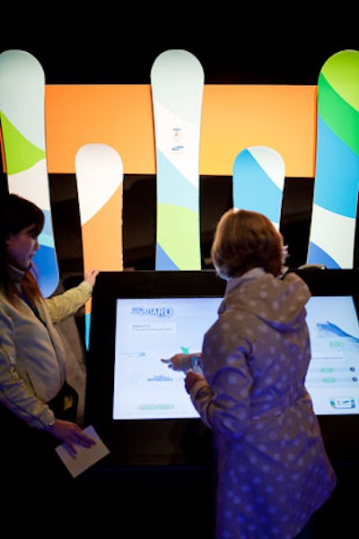 At one of several computing stations, guests could create their own snowboard designs in a competition to win a free board.