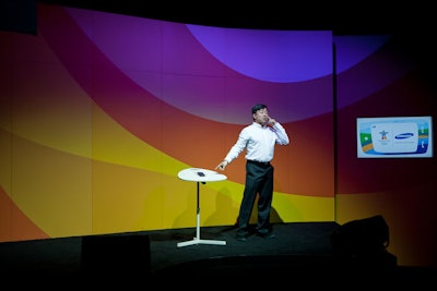 Samsung staffers at the pavilion educate guests on the latest mobile technology and show them how to upload their images to its Olympic database.