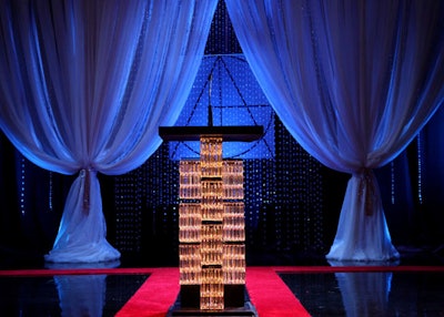 Swarovski's sponsorship made for a twinkling set and decor made with 500,000 crystals, including a podium that used 10 Glitterbox Lanterns in a custom design.