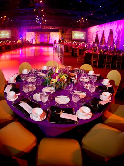ConceptBAIT used plum and gold linens throughout the dining area.
