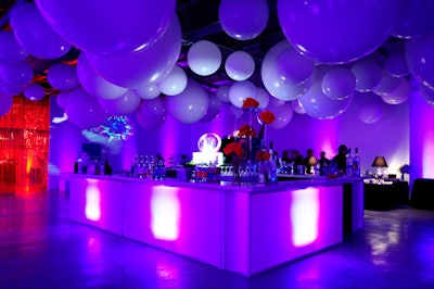 The main event space had white balloons suspended from the ceiling.