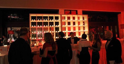 A bar near the dance floor was lit with flickering votive candles.
