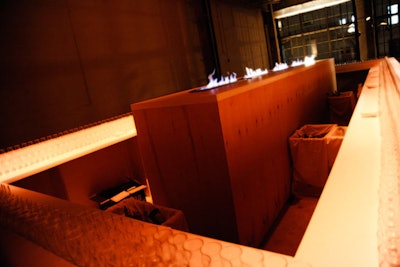 To create a continuous fire strip at the main bar, the production crew placed three-foot-long burners atop a central column.