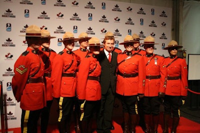 Wayne Gretzky posed with officers from the Royal Canadian Mounted Police during Wayne Gretzky Day at the venue on Friday.