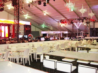 The fan zone is filled with white furnishings, which can be reconfigured for a variety of events.