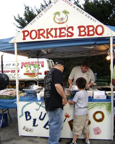 Five local barbecue companies set up food stations around the plaza.