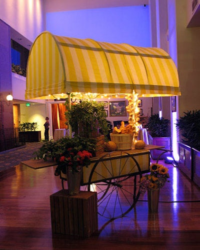 Channeling Montmartre for the cocktail hour in the hotel's Esplanade, Art of the Event brought in a turn-of-the-century style French market cart as decor.