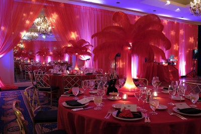 New Orleans-based Fancy Faces supplied the feather-topped centerpieces that were lit from within.