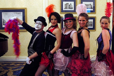 In between dinner courses, cancan dancers and a mime taught guests the famous French dance.