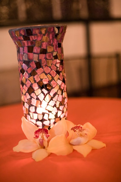 Orchids and mosaic-tiled candle holders also played into the decor.