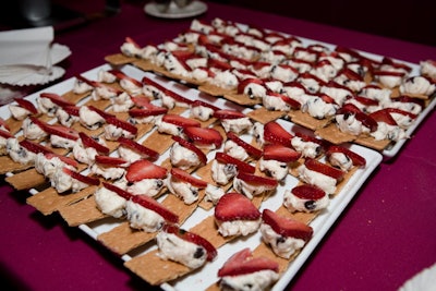 RJ Grunts prepared graham crackers topped with strawberries and chocolate chip cream cheese.