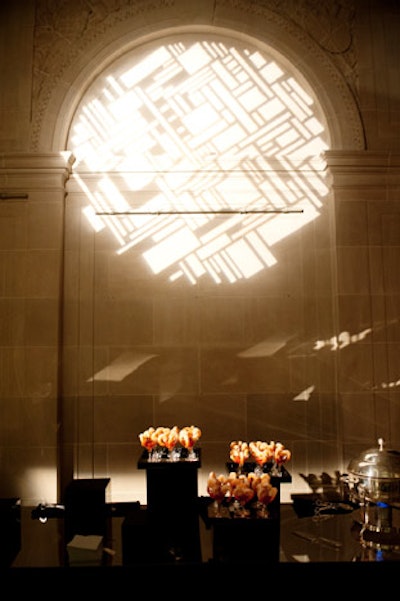 To highlight the Art Deco theme, the design team also projected geometric shapes onto the walls of the garden court.