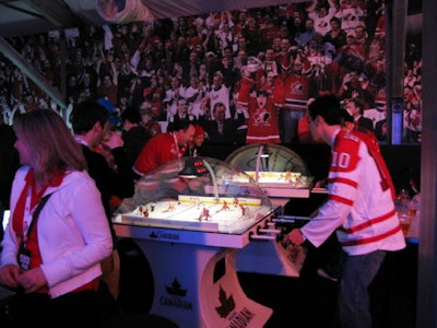 While other pavilions were country-focused, the 81,000-square-foot Molson Canadian Hockey House was all about hockey. Fans could root on their gold medal-winning team by playing Molson branded table hockey games.
