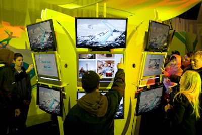 Touch screens at the Acer pavilion tested visitors with quizzes and athletic games.