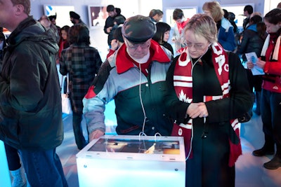 The 3,000-square-foot Bell Ice Cube showcased the telecommunications company's range of Internet, phone, and television services, with interactive viewing screens set up throughout the space.