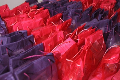 The evening's gift bags included dark- and white-chocolate-covered fortune cookies that read, 'Fortune favors those who give generously, thank you for supporting Artrageous 2010.'