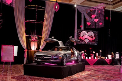 Three 2011 Mercedes SLS cars raised close to $800,000 at auction.