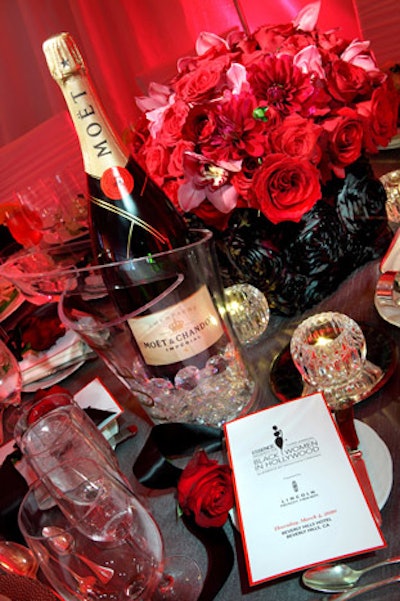 Bottles from sponsor Moët & Chandon sat on tabletops in transparent buckets.