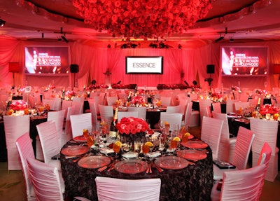 Crystals from decor sponsor Swarovski were embedded in the stage curtains and podium. Two screens for live feed and winners' reels flanked the stage.