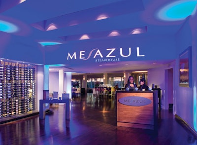 Mesazul's dining room has unobstructed views of the Doral Golf Resort's famed Blue Monster golf course through floor-to-ceiling windows.