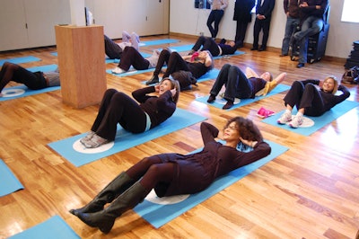 Attendees participated in a fitness demonstration at the launch at 99 Sudbury.