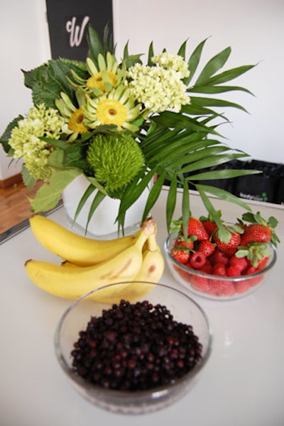 Bowls of fruit and fresh flowers topped the bar where servers offered sparkling water and unsweetened iced tea.