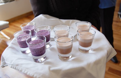 Servers offered samples of Bodylogix's berry and chocolate-banana protein shakes.