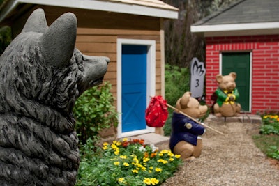 The Chicago High School for Agricultural Sciences designed three gardens inspired by fairy tales, dubbed 'Great Performances Through the Eyes of a Child.' Animal statues and mini houses fill the 'Three Little Pigs' garden.