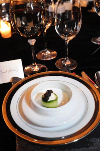 The dinner's first course from MAX Ultimate Food comprised parsnip mouse, caviar, and a cucumber ribbon.