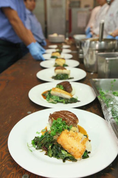 The Ronald Reagan Building's catering department served a filet of cod with beef tenderloin, roasted garlic mashed potatoes, and sautéed Swiss chard with Banyuls red wine sauce for the main course.