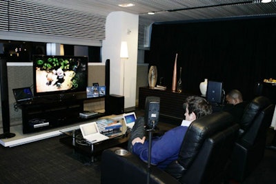 In the living room station, guests sat down to watch Blu-ray-playing notebooks sync up with television sets.