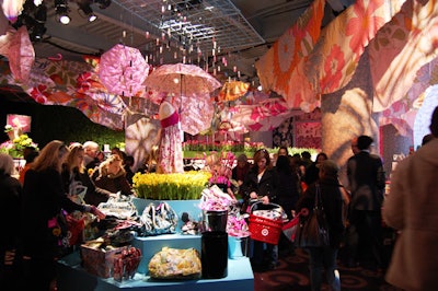 In a nod to spring's wet weather, umbrellas feature prominently in the decor, including one display that simulates rain with strands of reflective pieces.