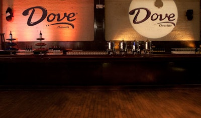 The focal point of the room was the existing bar, where servers paired Dove chocolates with different wines.